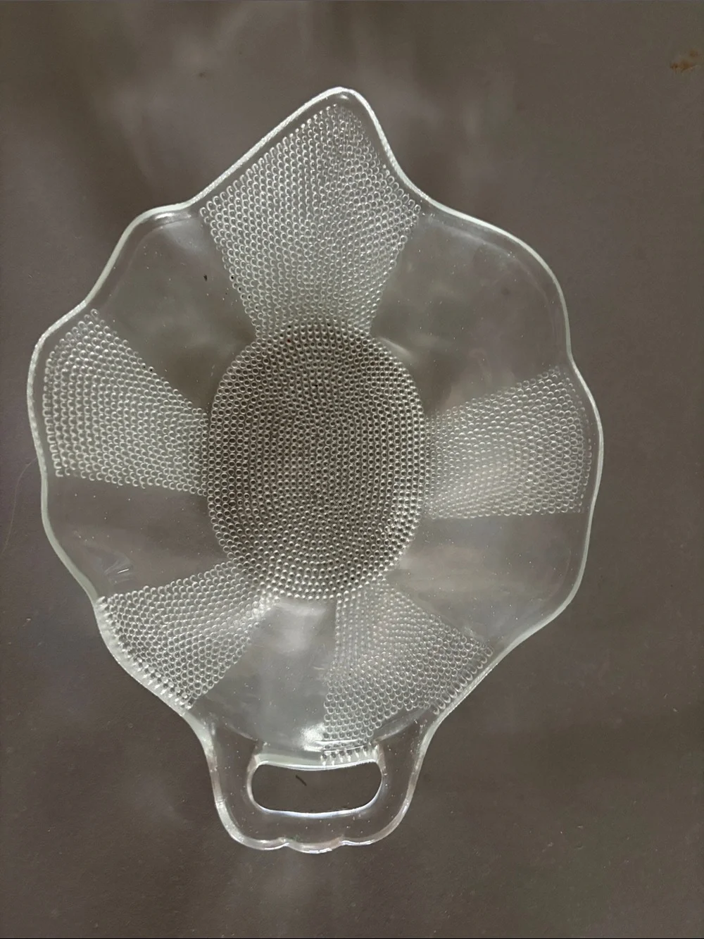 This is a vintage Jeannette Glass Co. Dewdrop pattern glass dish
